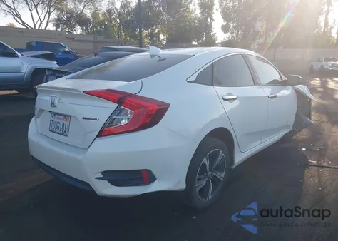 2017 Honda Civic Touring from USA, damaged, VIN 2HGFC1F9XHH658317